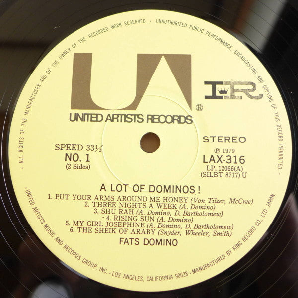 ...A Lot Of Dominos !