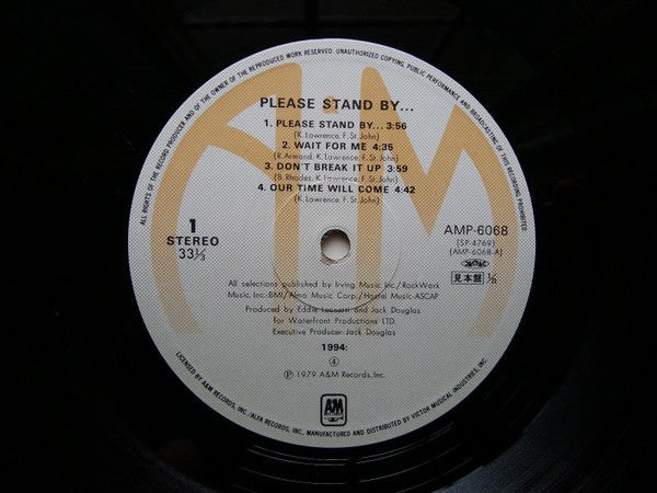 Please Stand By...