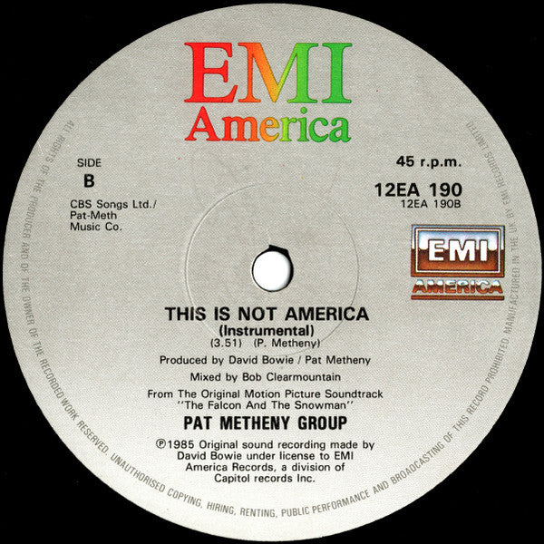 Release: This Is Not America (Theme From The Motion Picture, The Falcon And The Snowman)-Vinyl-UK-1985-12EA 190, 12 EA 190-196707