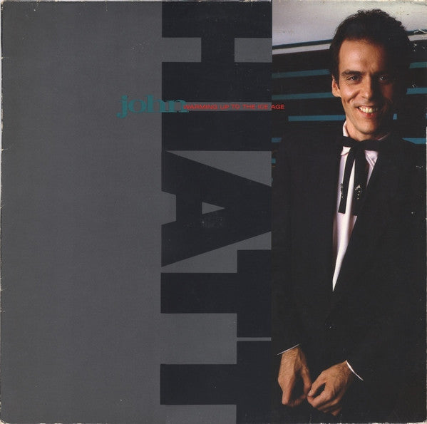 Master Release: Warming Up To The Ice Age by John Hiatt
