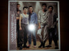 The Boomtown Rats - In The Long Grass (Vinyl, LP, Album) Near Mint (NM or M-) / Near Mint (NM or M-)