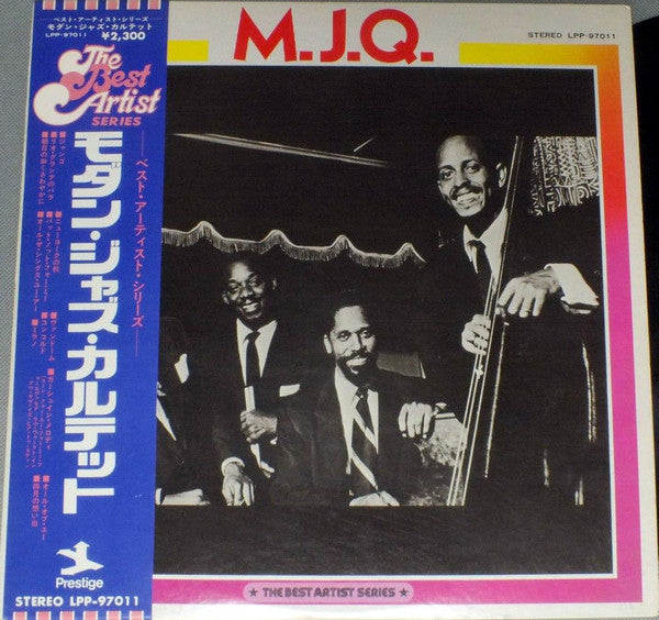 M.J.Q.