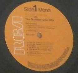 Master Release: The Number One Hits by Elvis Presley