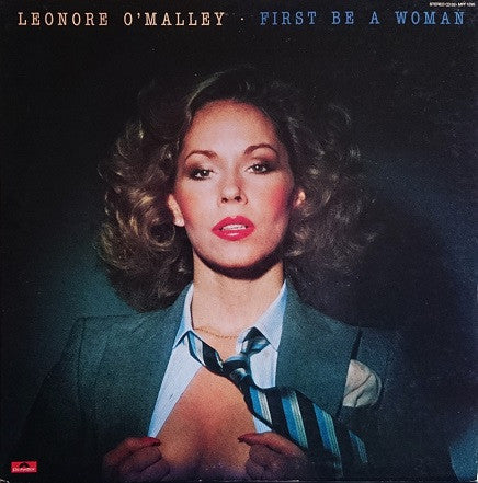 Master Release: First Be A Woman by Lenore O'Malley