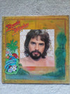 Bertie Higgins - Just Another Day In Paradise (Vinyl, LP, Album, Stereo) Very Good (VG) / Very Good Plus (VG+)