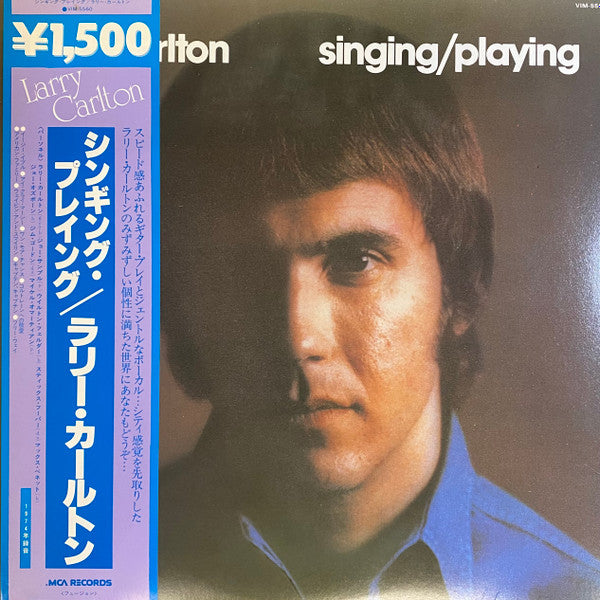 Master Release: Singing / Playing by Larry Carlton