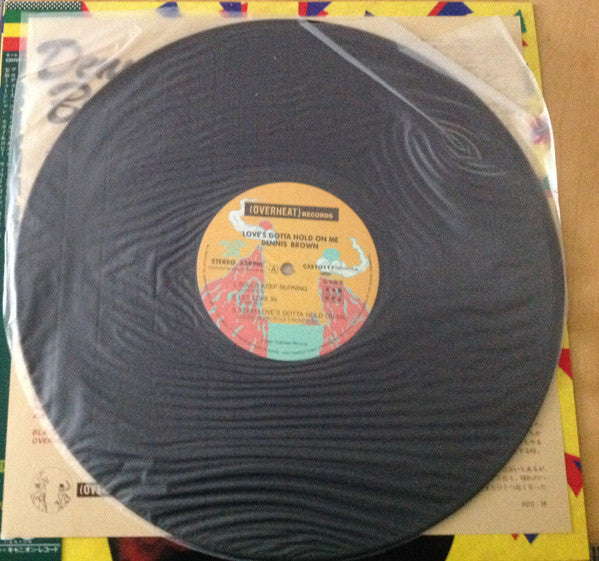 Master Release: Love's Gotta Hold On Me by Dennis Brown